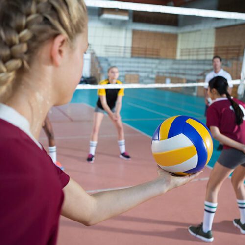 female-players-playing-volleyball-in-the-court-2021-08-28-16-46-46-utc